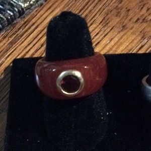 Stone ring with bezel set garnet